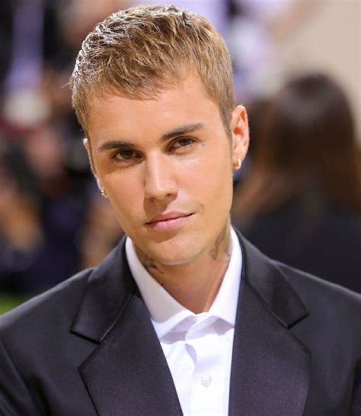 Unveiling The Age: How Old Is Justin?